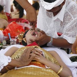 Witnessing the Teeth filling Ceremony in the Middle of Balinese Communities