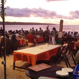 Enjoying Sunset While Tasting the Delicious Seafood at Jimbaran Beach